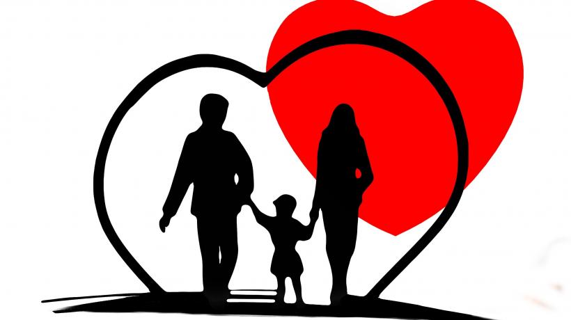 Grafik von Mutter, Vater und Kind in einem Herz